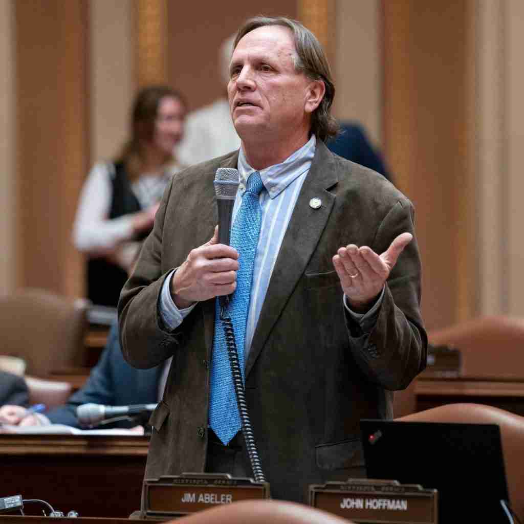 Senator Jim Abeler standing and speaking